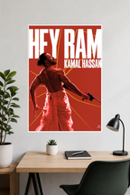 Image 2 (Desk Mockup View): Hey Ram Kamal Haasan wall poster hung above a modern wooden study desk and desk lamp.