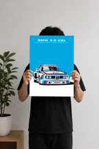 BMW 3.0 CSL vintage racing poster featuring the iconic BMW Motorsport race car displayed on a modern office wall.