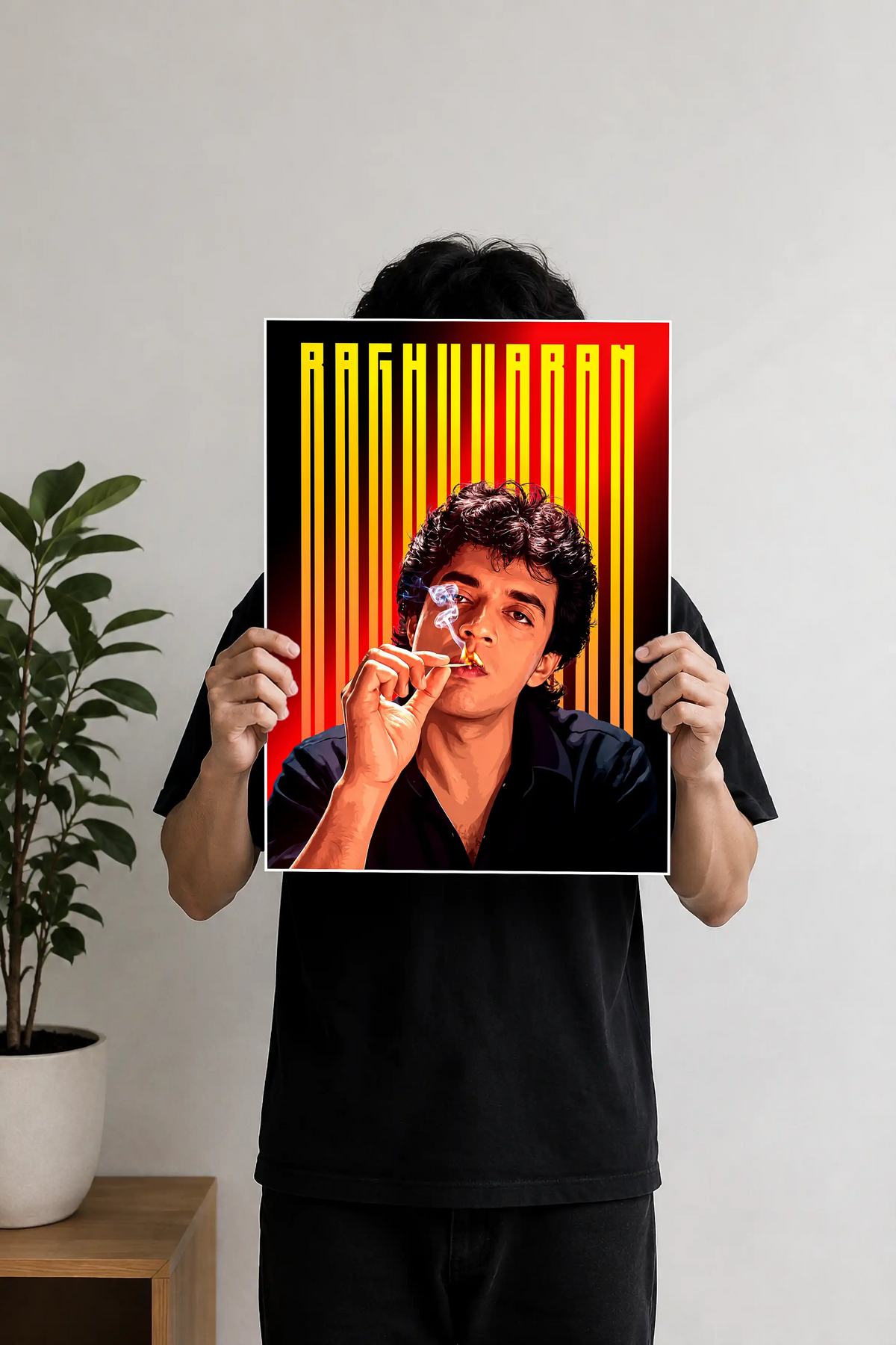 Image 2 (Desk Mockup View): Raghuvaran cult Tamil cinema wall art poster mounted above a wooden desk with a black desk lamp.