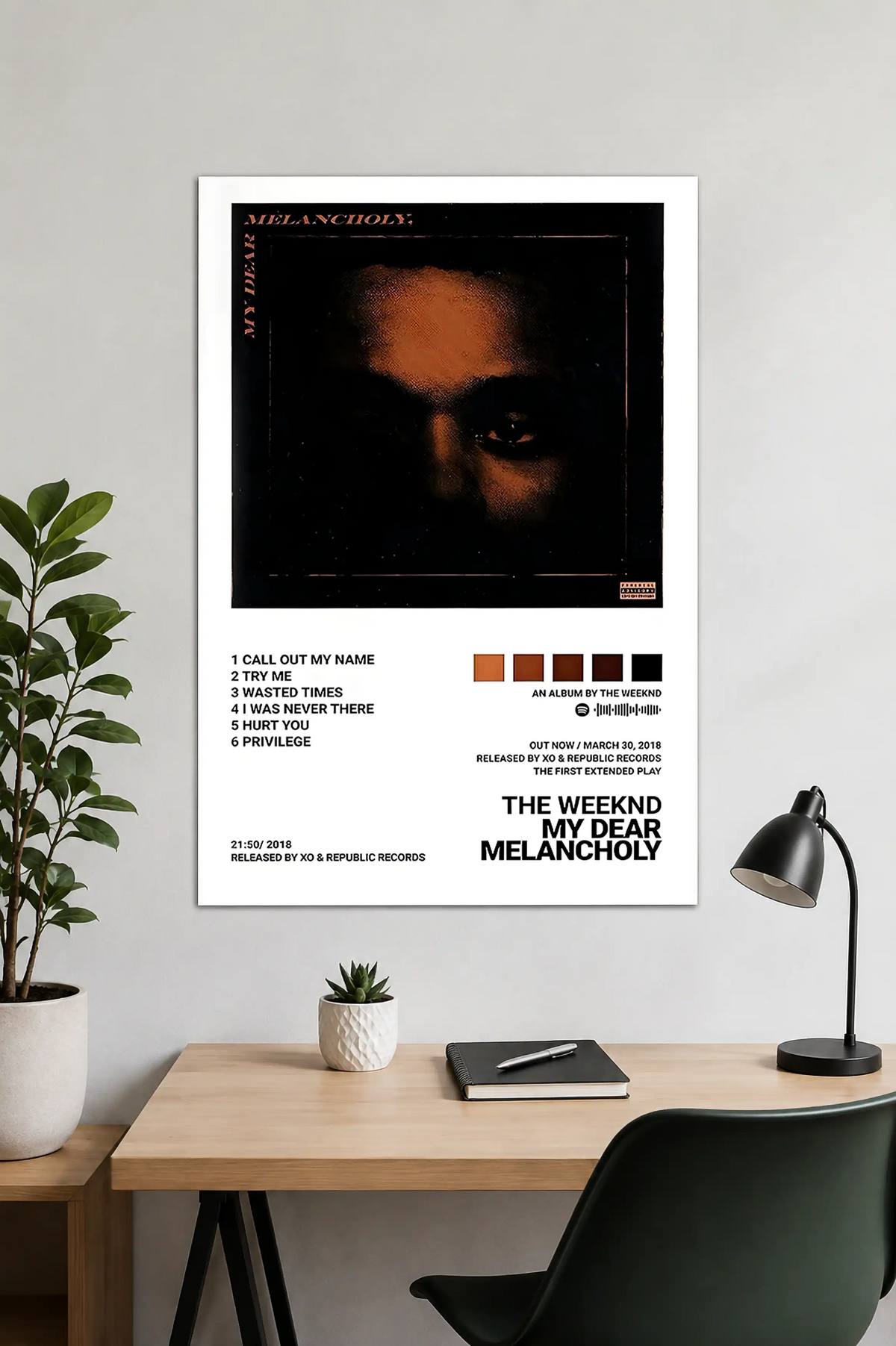 The Weeknd My Dear Melancholy poster held by a person featuring minimalist album-inspired music wall art